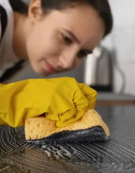woman-cleaning-home-kitchen-1200x675