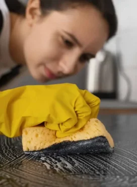 woman-cleaning-home-kitchen-1200x675