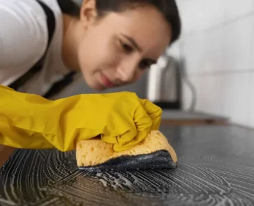 woman-cleaning-home-kitchen-1200x675