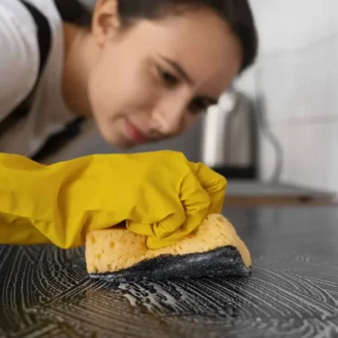 woman-cleaning-home-kitchen-1200x675