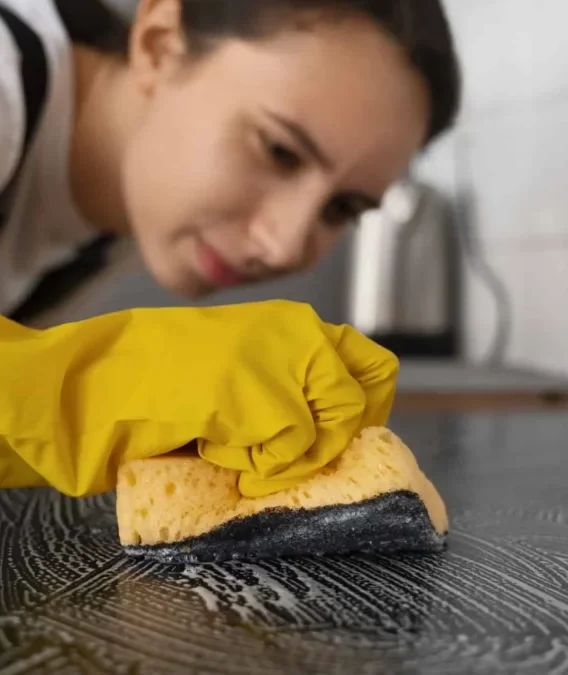 woman-cleaning-home-kitchen-1200x675